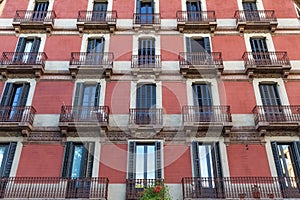 Details of the one of typical old residential buildings in the historical center of Barcelona in sunny day. Spain