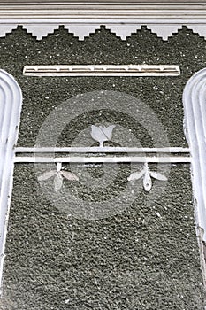 Details of a peculiar friendly facade of an old house in Sic village, Transylvania