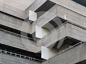 Details of railings and balconies on an old brutalist concrete building