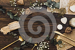 Details of a rustic wedding over wooden background. Flat Lay, Top View