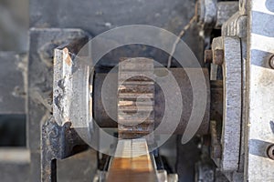 Details of rusty gear, rack and pinion.