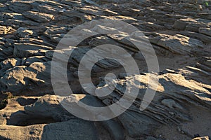 Details on sand rocks at Praia do Malhao beach, in Portugal