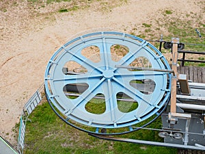 Details of the ski lift engine wheel. Elements of the steel wheel