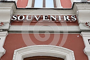 Details of souvenirs sign on building wall