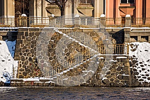 Details of the stones of Pragues riverbank Naplavka by Moldau