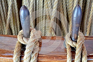 Details of tied rope from boat and wooden tools