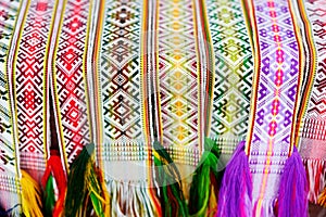 Details of a traditional colorful Lithuanian weave. Woven belts as a part of national Lithuanian costume.