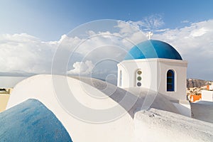 Details of a traditional Greek orthodox blue dome church, Santorini, Greece