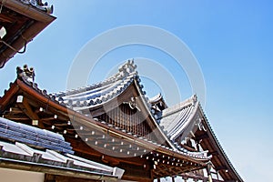 Details Of Traditional Wooden Japanese Temple Roof In area Buddhist temple and Park is identity In Kyoto.