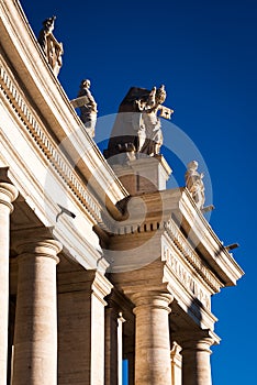 Details of the Vatican facade in St. Peter`s Square in Rome