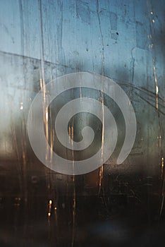 Details of windows in a train in morning light