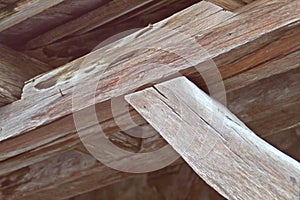 Details of the wooden structure of a traditional medieval arcade in Sighisoara, Romania.