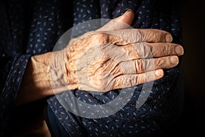 Details of the wrinkle hand of a elder woman