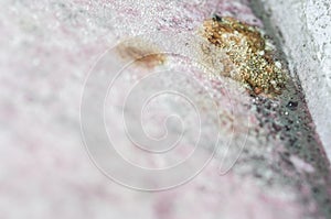 Detal of mold and moisture buildup on pink wall photo