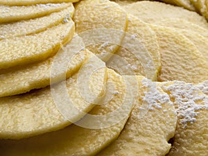 Close-up detail of an apple pie in its mold and 2 photo