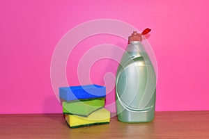 Detergent bottle and sponges for washing. Household for cleaning and washing. Concentrated and anti-bacterial liquids for