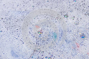 Detergent foam bubble as background texture select focus shallow depth of field.