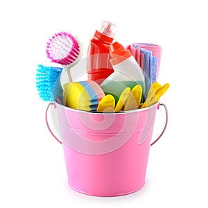 Detergents and cleaning products in bucket  on white
