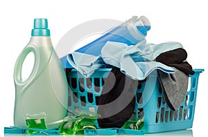 Detergents and clothes in baske