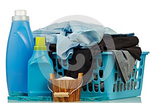 Detergents and clothes in baske photo