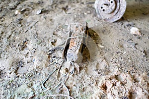 Deteriorated light fixture ballast in old building