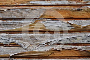 Deteriorated wooden door with varnish peeling off