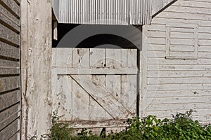 Deteriorating 19th century barn wall texture background