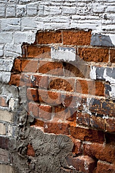 Deteriorating Patchwork Brick Wall