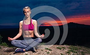 Determined Athletic Fitness Woman Meditating