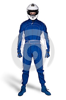 Determined race driver in blue white motorsport overall shoes gloves and integral safety crash helmet isolated white background.