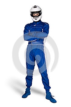 Determined race driver in blue white motorsport overall shoes gloves and integral safety crash helmet isolated white background.