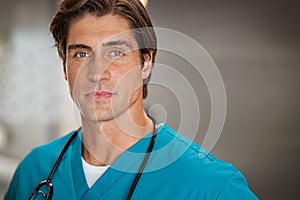 Determined young doctor looking at camera