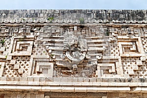 Detil of the stonework at the Palacio del Gobernador Governor`s Palace building in the ruins of the ancient Mayan city photo