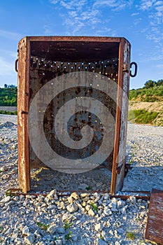 A detonation barrel in a quarry.