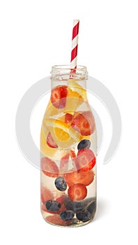 Detox beverage of blueberry strawberry orange, isolated on white background