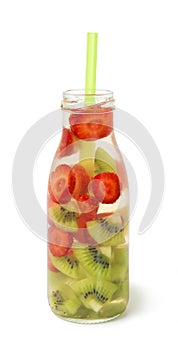 Detox beverage of strawberry, kiwi in glass bottle, isolated on white background.