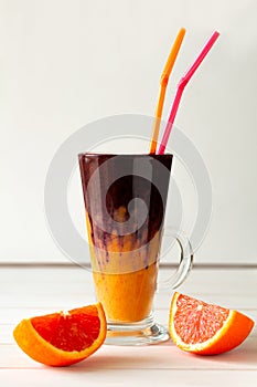 Detox citrus, banana and blueberry smoothie. Healthy food or vegetarian concept. Selective focus