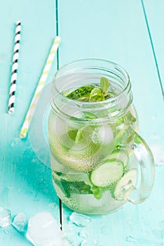 Detox cocktail of mint, cucumber and lemon photo