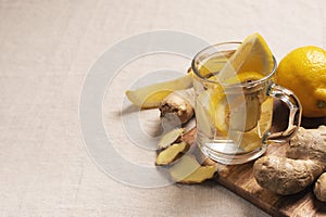 Detox and diet ginger drink with lemon in glass