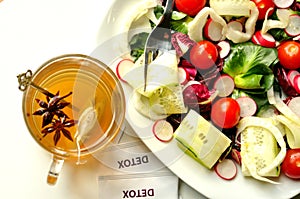 Detox diet with veggie salad and herbal tea