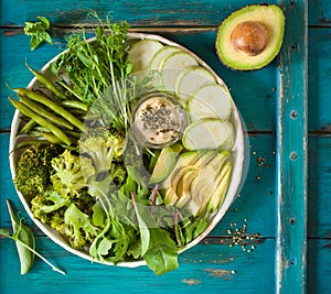 Detox food concept buddha bowl with green vegetables photo