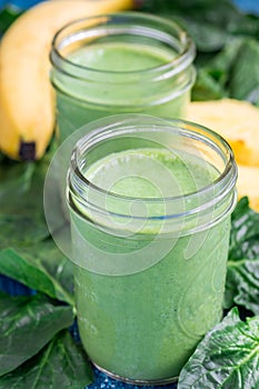 Detox green smoothie with spinach, pineapple, banana and yogurt