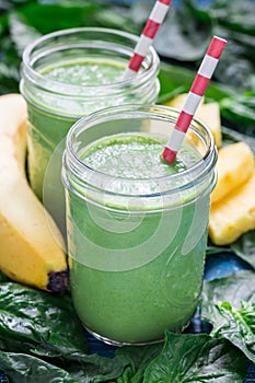 Detox green smoothie with spinach, pineapple, banana, yogurt