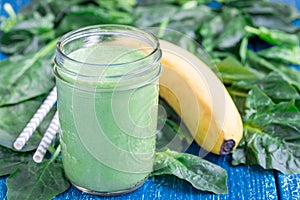 Detox green smoothie with spinach, pineapple, banana and yogurt