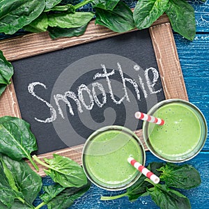 Detox green smoothie with spinach, pineapple, banana and yogurt, top view, square