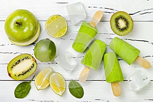 Detox, healthy green smoothie popsicles.