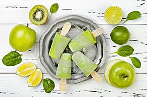 Detox, healthy green smoothie popsicles.