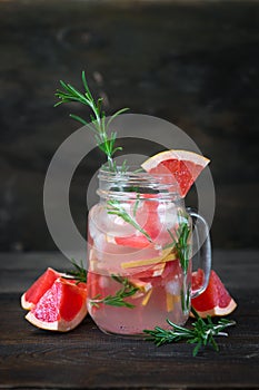 Detox refreshing cocktail from grapefruit and rosemary with ice.