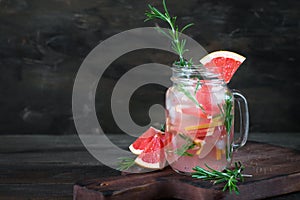 Detox refreshing cocktail from grapefruit and rosemary with ice.