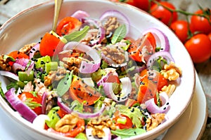 Detox , veggie, raw salad with tomato, onions and walnuts